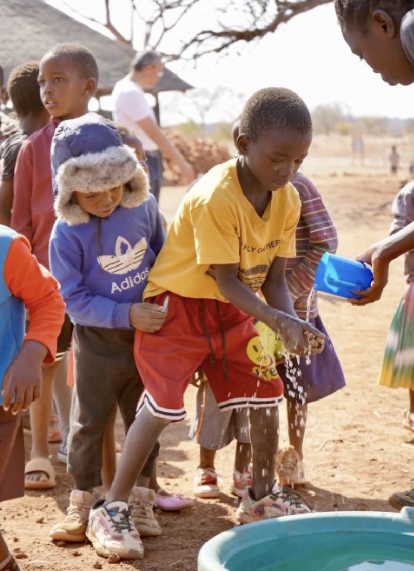 Mamă cu copilul în brațe, Zambia